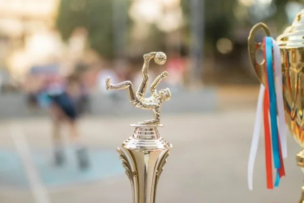 celebrating athlete trophy